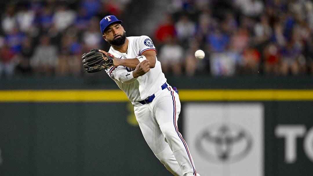 Jun 18, 2026; Arlington, Texas, USA; Texas Rangers shortstop Ezequiel Duran (20) throws out Minnesota Twins center fielder Byron Buxton (not pictured) during the second inning at Globe Life Field. Mandatory Credit: Jerome Miron-Imagn Images