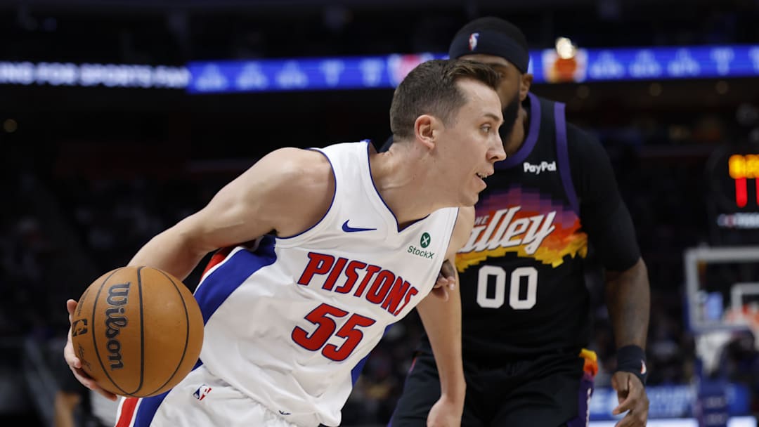 Jan 15, 2026; Detroit, Michigan, USA;  Detroit Pistons forward Duncan Robinson (55) dribbles 2g against the Phoenix Suns at Little Caesars Arena. Mandatory Credit: Rick Osentoski-Imagn Images