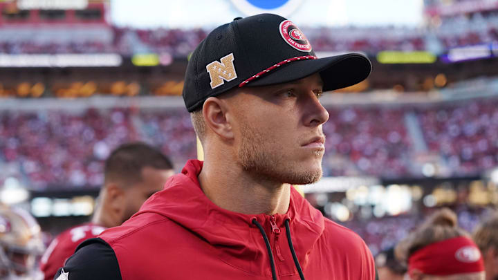 San Francisco 49ers running back Christian McCaffrey (23) watches from the sideline. San Francisco 49ers running back Christian McCaffrey (23) watches from the sideline.