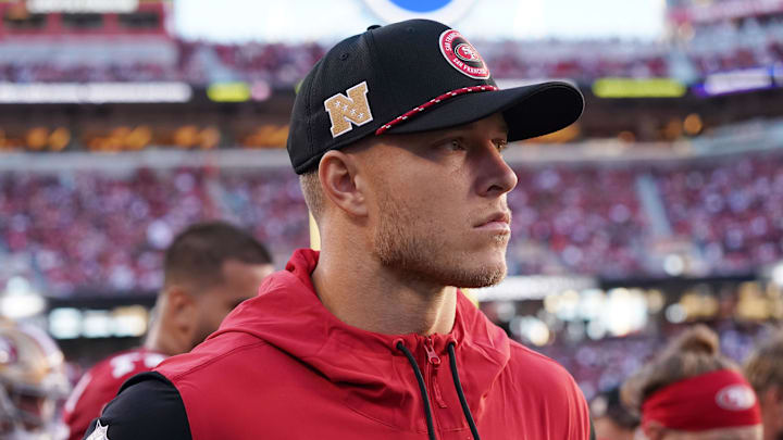 Sep 9, 2024; Santa Clara, California, USA; San Francisco 49ers running back Christian McCaffrey (23) watches from the sideline due to injury during the second quarter against the New York Jets at Levi's Stadium. Mandatory Credit: David Gonzales-Imagn Images