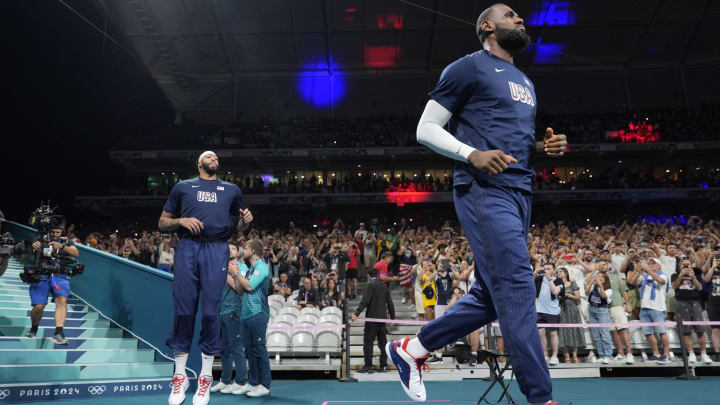 Jul 31, 2024; Villeneuve-d'Ascq, France;  United States forward LeBron James takes the floor before a game against South Sudan during the Paris 2024 Olympic Summer Games at Stade Pierre-Mauroy. Mandatory Credit: John David Mercer-USA TODAY Sports