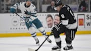 Mar 30, 2025; Los Angeles, California, USA;  Los Angeles Kings right wing Adrian Kempe (9) skates the puck down ice in the second period against the San Jose Sharks at Crypto.com Arena. Mandatory Credit: Jayne Kamin-Oncea-Imagn Images