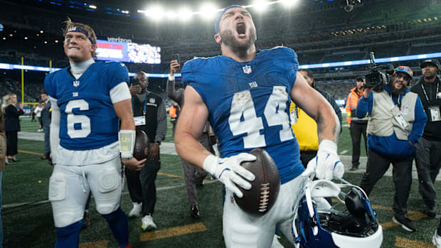 New York Giants running back Cam Skattebo (44) and New York Giants quarterback Jaxson Dart 