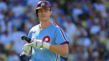 Philadelphia Phillies catcher J.T. Realmuto (10) reacts after striking out in the second inning against the Los Angeles Dodgers during game four of the NLDS round for the 2025 MLB playoffs at Dodger Stadium. 