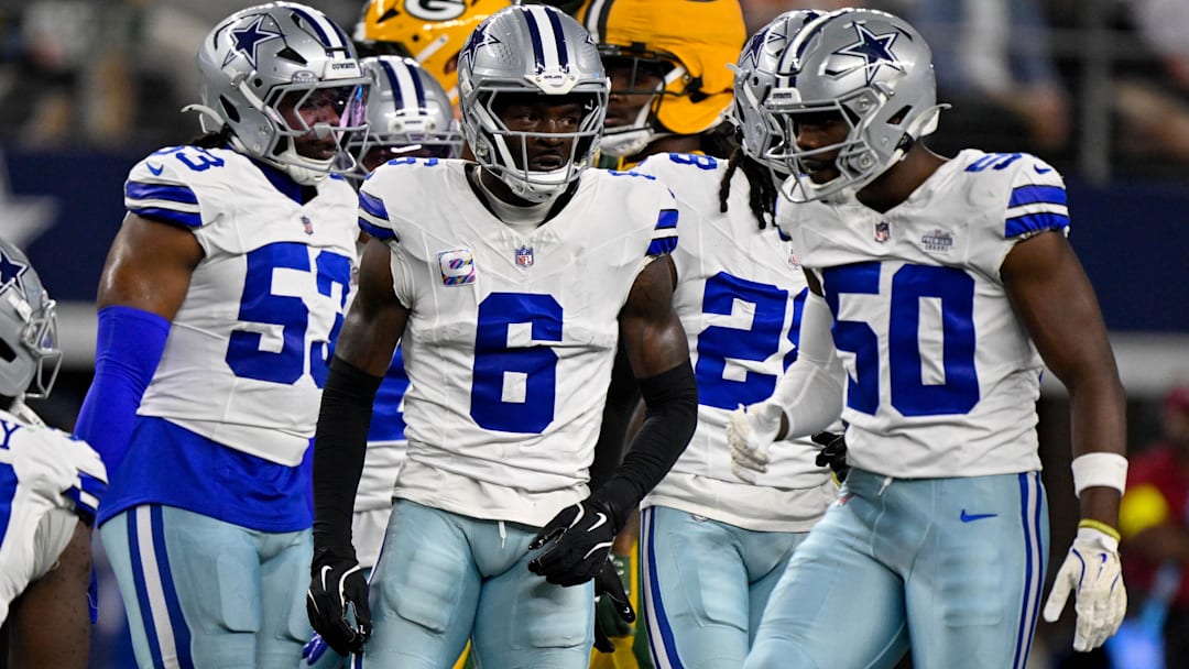 Sep 28, 2025; Arlington, Texas, USA; Dallas Cowboys defensive end James Houston (53), safety Donovan Wilson (6), and linebacker Shemar James (50) celebrate during the game between the Dallas Cowboys and the Green Bay Packers at AT&T Stadium.