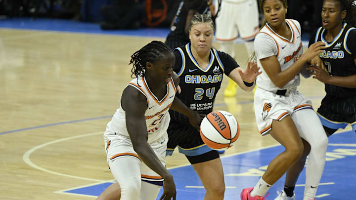 Jun 21, 2025; Chicago, Illinois, USA; Phoenix Mercury center Murjanatu Musa (20) moves the ball against Chicago Sky guard Rachel Banham (24) during the first half at Wintrust Arena. Mandatory Credit: Matt Marton-Imagn Images Jun 21, 2025; Chicago, Illinois, USA; Phoenix Mercury center Murjanatu Musa (20) moves the ball against Chicago Sky guard Rachel Banham (24) during the first half at Wintrust Arena. Mandatory Credit: Matt Marton-Imagn Images