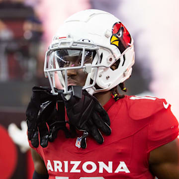 Aug 10, 2024; Glendale, Arizona, USA; Arizona Cardinals wide receiver Marvin Harrison Jr. (18) against the New Orleans Saints during a preseason NFL game at State Farm Stadium. Mandatory Credit: Mark J. Rebilas-Imagn Images
