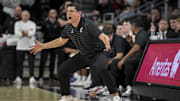 Cincinnati Bearcats head coach Wes Miller works the sideline against the Baylor Bears in the second half at Fifth Third Arena. 