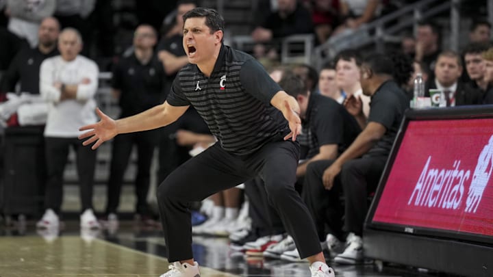 Cincinnati Bearcats head coach Wes Miller works the sideline against the Baylor Bears in the second half at Fifth Third Arena. 