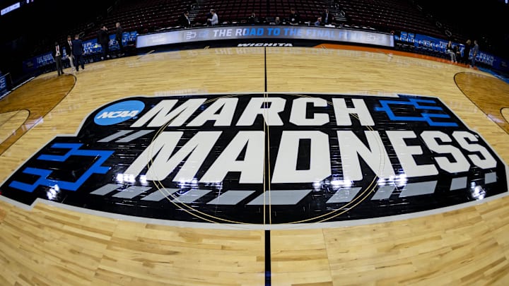 Mar 22, 2025; Wichita, KS, USA; A general view of a March Madness logo at center court before the game between the Texas Tech Red Raiders and the Drake Bulldogs at Intrust Bank Arena. Mar 22, 2025; Wichita, KS, USA; A general view of a March Madness logo at center court before the game between the Texas Tech Red Raiders and the Drake Bulldogs at Intrust Bank Arena.