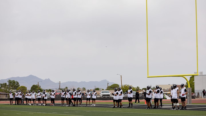 Hanks football players warm up before their homecoming game against Americas on Thursday, Sept. 4, 2025, at Hanks High School in El Paso, Texas. Hanks football players warm up before their homecoming game against Americas on Thursday, Sept. 4, 2025, at Hanks High School in El Paso, Texas.