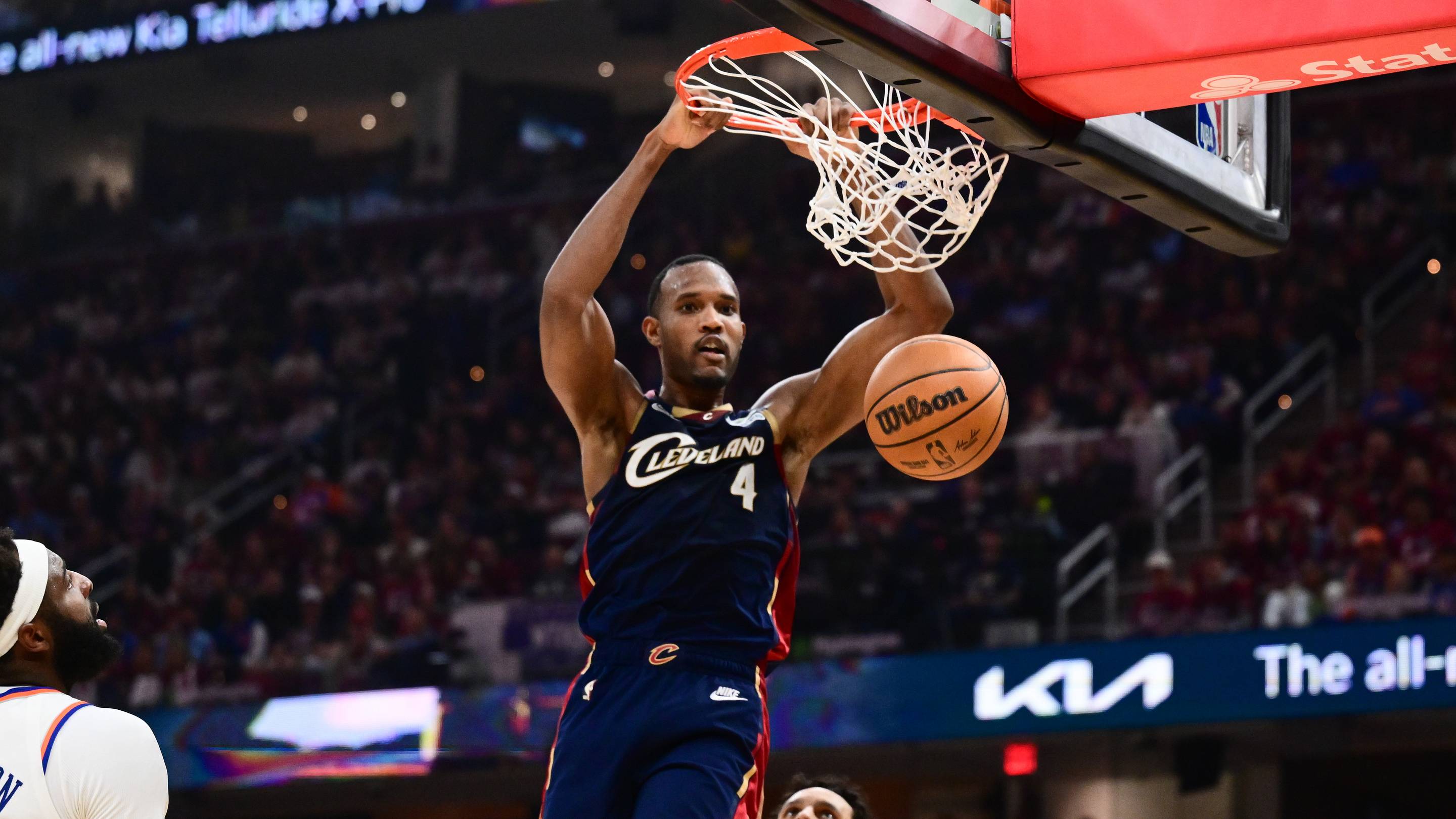 May 25, 2026; Cleveland, Ohio, USA; Cleveland Cavaliers forward Evan Mobley (4) dunks in the third quarter against the New York Knicks during game four of the eastern conference finals for the 2026 NBA playoffs at Rocket Arena. Mandatory Credit: Ken Blaze-Imagn Images