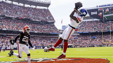 Sep 22, 2024; Cleveland, Ohio, USA; New York Giants wide receiver Malik Nabers (1) makes a touchdown reception under coverage by Cleveland Browns cornerback Martin Emerson Jr. (23) during the second quarter at Huntington Bank Field. Mandatory Credit: Scott Galvin-Imagn Images