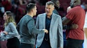 Oklahoma head coach Porter Moser and Saint Francis head coach Luke McConnell meet before an NCAA Men’s basketball game between the Oklahoma Sooners and the Saint Francis Red Flash at Lloyd Noble Center in Norman, Okla., on Monday, Nov. 3, 2025.