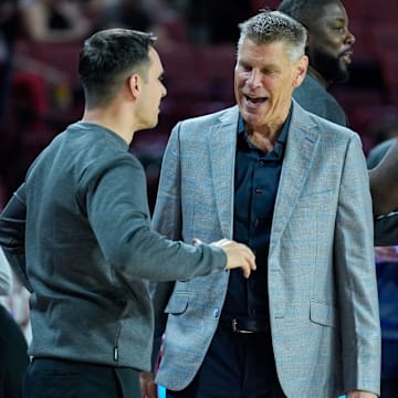 Oklahoma head coach Porter Moser and Saint Francis head coach Luke McConnell meet before an NCAA Men’s basketball game between the Oklahoma Sooners and the Saint Francis Red Flash at Lloyd Noble Center in Norman, Okla., on Monday, Nov. 3, 2025.
