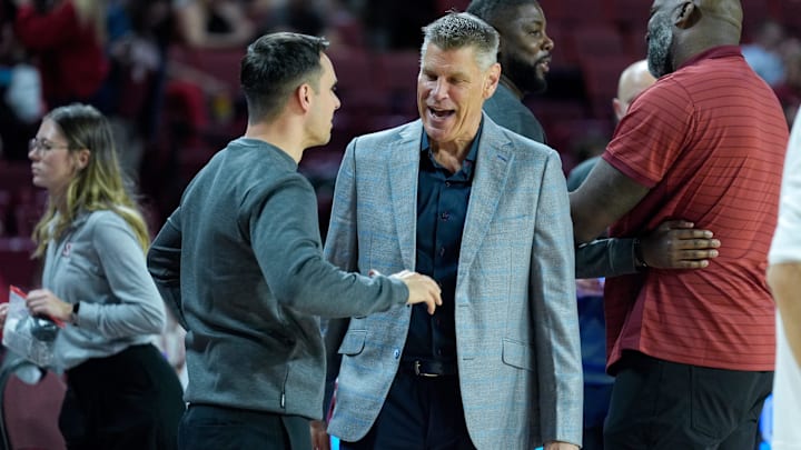 Oklahoma head coach Porter Moser and Saint Francis head coach Luke McConnell meet before an NCAA Men’s basketball game between the Oklahoma Sooners and the Saint Francis Red Flash at Lloyd Noble Center in Norman, Okla., on Monday, Nov. 3, 2025.