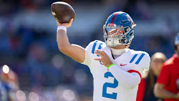 Nov 23, 2024; Gainesville, Florida, USA; Mississippi Rebels quarterback Jaxson Dart (2) warms up before a game against the Florida Gators at Ben Hill Griffin Stadium. Mandatory Credit: Matt Pendleton-Imagn Images
