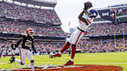 Sep 22, 2024; Cleveland, Ohio, USA; New York Giants wide receiver Malik Nabers (1) makes a touchdown reception under coverage by Cleveland Browns cornerback Martin Emerson Jr. (23) during the second quarter at Huntington Bank Field. Mandatory Credit: Scott Galvin-Imagn Images