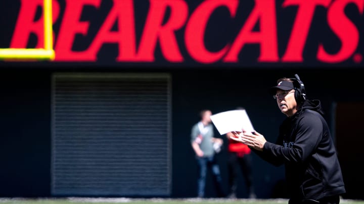 Cincinnati Bearcats head coach Scott Satterfield claps after a good field goal during the University of Cincinnati annual Red and Black Spring football game and practice at Nippert Stadium in Cincinnati on Saturday, April 13, 2024.