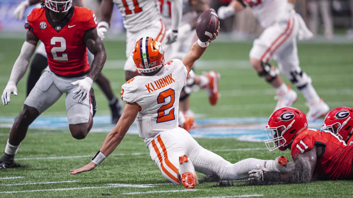 Aug 31, 2024; Atlanta, Georgia, USA; Georgia Bulldogs linebacker Jalon Walker (11) tackles Clemson Tigers quarterback Cade Klubnik (2) during the second half at Mercedes-Benz Stadium. Mandatory Credit: Dale Zanine-USA TODAY Sports