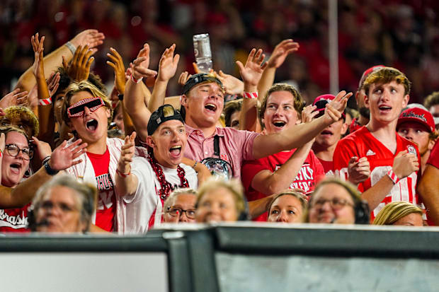 Nebraska fans sing during a break in the Huskers' 2023 volleyball match against the Omaha Mavericks at Memorial Stadium.