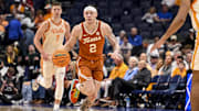 Texas Longhorns guard Chendall Weaver (2) dribbles the ball against the Tennessee Volunteers during the second half.