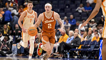 Texas Longhorns guard Chendall Weaver (2) dribbles the ball against the Tennessee Volunteers during the second half.