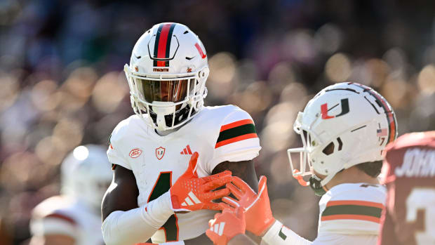 Xavier Restrepo celebrates with teammate after touchdow