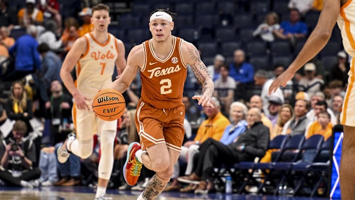 Texas Longhorns guard Chendall Weaver (2) dribbles the ball against the Tennessee Volunteers during the second half.