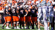 Nov 15, 2025; Stillwater, Oklahoma, USA; Oklahoma State Cowboys huddle during the first half against the Kansas State Wildcats at Boone Pickens Stadium. Mandatory Credit: William Purnell-Imagn Images