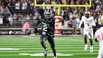 Sep 21, 2024; Chestnut Hill, Massachusetts, USA; Michigan State Spartans quarterback Aidan Chiles (2) runs the ball against the Boston College Eagles during the first half at Alumni Stadium. Mandatory Credit: Eric Canha-Imagn Images