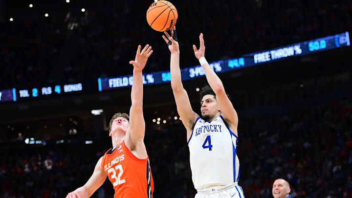 Mar 23, 2025; Milwaukee, WI, USA;  Kentucky Wildcats guard Koby Brea (4) shoots agsaint Illinois Fighting Illini guard Kasparas Jakucionis (32) during the second half in the second round of the NCAA Tournament at Fiserv Forum. Mandatory Credit: Benny Sieu-Imagn Images