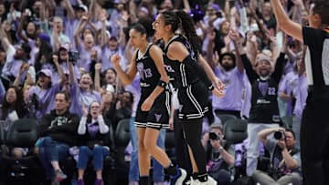 Golden State Valkyries guard Veronica Burton (22) and forward Janelle Salaun (13) celebrate after a basket against the Minnesota Lynx in the third quarter in game two of round one for the 2025 WNBA Playoffs at SAP Center. 