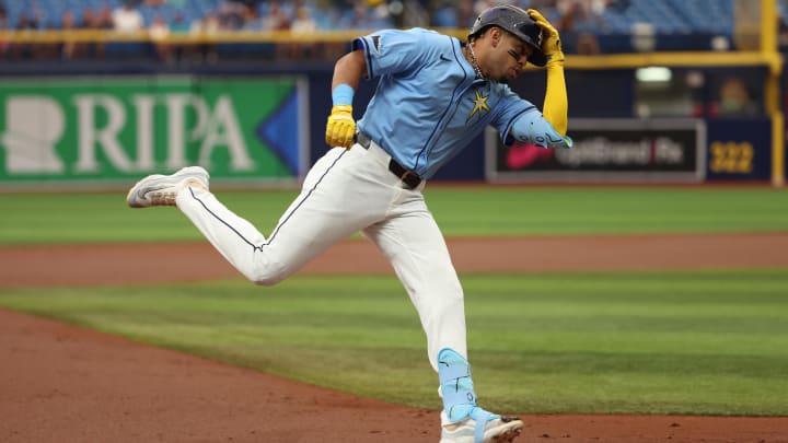 Jul 31, 2024; St. Petersburg, Florida, USA;  Tampa Bay Rays infielder Christopher Morel (24) runs around the bases after hitting a home run against the Miami Marlins during the first inning at Tropicana Field. Mandatory Credit: Kim Klement Neitzel-USA TODAY Sports