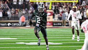 Sep 21, 2024; Chestnut Hill, Massachusetts, USA; Michigan State Spartans quarterback Aidan Chiles (2) runs the ball against the Boston College Eagles during the first half at Alumni Stadium. Mandatory Credit: Eric Canha-Imagn Images