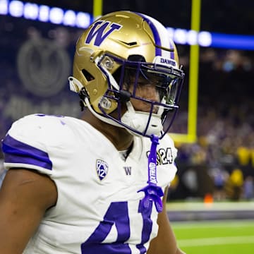 Jan 8, 2024; Houston, TX, USA; Washington Huskies edge Lance Holtzclaw (41) against the Michigan Wolverines during the 2024 College Football Playoff national championship game at NRG Stadium. Mandatory Credit: Mark J. Rebilas-Imagn Images