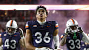 Nov 8, 2025; Charlottesville, Virginia, USA; Virginia Cavaliers safety Caleb Hardy (26) looks on from the field prior to the game against the Wake Forest Demon Deacons at Scott Stadium. Mandatory Credit: Amber Searls-Imagn Images