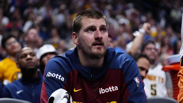 May 9, 2025; Denver, Colorado, USA; Denver Nuggets center Nikola Jokic (15) on the bench in the fourth quarter against the Oklahoma City Thunder during game three of the second round for the 2025 NBA Playoffs at Ball Arena. Mandatory Credit: Ron Chenoy-Imagn Images