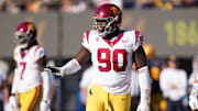 Oct 28, 2023; Berkeley, California, USA; USC Trojans defensive lineman Bear Alexander (90) gestures during the third quarter against the California Golden Bears at California Memorial Stadium. Mandatory Credit: Darren Yamashita-Imagn Images