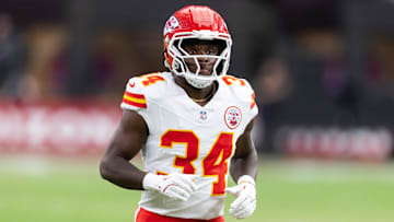 Aug 9, 2025; Glendale, Arizona, USA; Kansas City Chiefs running back Elijah Young (34) against the Arizona Cardinals during a preseason NFL game at State Farm Stadium.