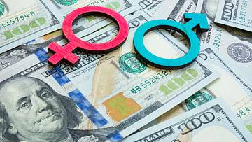 Salary and wage gap concept. Gender symbols and money.
