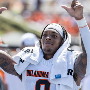 Sep 14, 2024; Tulsa, Oklahoma, USA;  Oklahoma State Cowboys running back Ollie Gordon II (0) acknowledges fans during the fourth quarter against the Tulsa Golden Hurricane at Skelly Field at H.A. Chapman Stadium. Mandatory Credit: Brett Rojo-Imagn Images