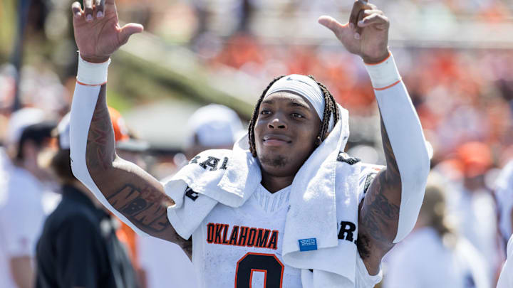 Sep 14, 2024; Tulsa, Oklahoma, USA;  Oklahoma State Cowboys running back Ollie Gordon II (0) acknowledges fans during the fourth quarter against the Tulsa Golden Hurricane at Skelly Field at H.A. Chapman Stadium. Mandatory Credit: Brett Rojo-Imagn Images