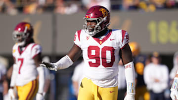 Oct 28, 2023; Berkeley, California, USA; USC Trojans defensive lineman Bear Alexander (90) gestures during the third quarter against the California Golden Bears at California Memorial Stadium.