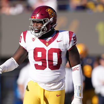 Oct 28, 2023; Berkeley, California, USA; USC Trojans defensive lineman Bear Alexander (90) gestures during the third quarter against the California Golden Bears at California Memorial Stadium. Mandatory Credit: Darren Yamashita-Imagn Images