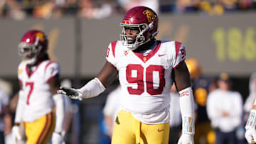 Oct 28, 2023; Berkeley, California, USA; USC Trojans defensive lineman Bear Alexander (90) gestures during the third quarter against the California Golden Bears at California Memorial Stadium.