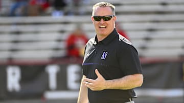 Oct 22, 2022; College Park, Maryland, USA; Northwestern Wildcats head coach Pat Fitzgerald on the field before the game against the Maryland Terrapins at SECU Stadium. Mandatory Credit: Brad Mills-Imagn Images