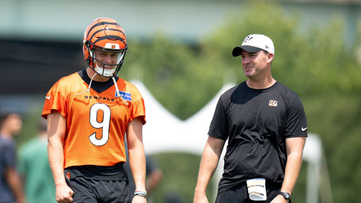 Cincinnati Bengals quarterback Joe Burrow (9) talks with Cincinnati Bengals head coach Zac Taylor during Cincinnati Bengals training camp in Cincinnati on Friday, July 26, 2024.