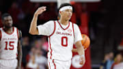 Feb 22, 2025; Norman, Oklahoma, USA; Oklahoma Sooners guard Jeremiah Fears (0) gestures to his team between plays against the Mississippi State Bulldogs during the second half at Lloyd Noble Center. Mandatory Credit: Alonzo Adams-Imagn Images