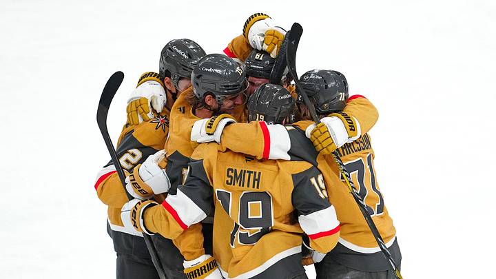 Apr 12, 2025; Las Vegas, Nevada, USA; Vegas Golden Knights defenseman Noah Hanifin (15) celebrates with team mates after scoring a goal against the Nashville Predators during the third period at T-Mobile Arena. Mandatory Credit: Stephen R. Sylvanie-Imagn Images